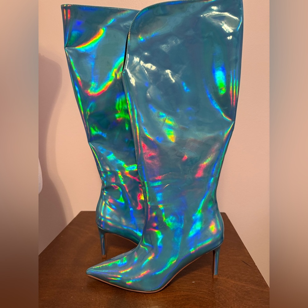 Smash Shimmering Blue Heeled Boots with dust covers.